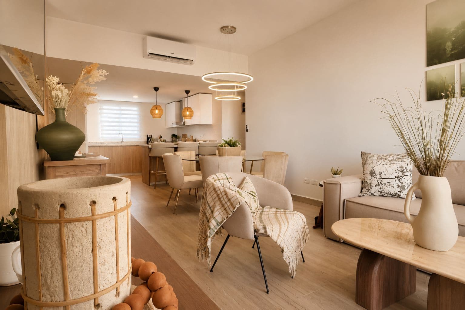Open-plan living and dining room with soft neutral furniture