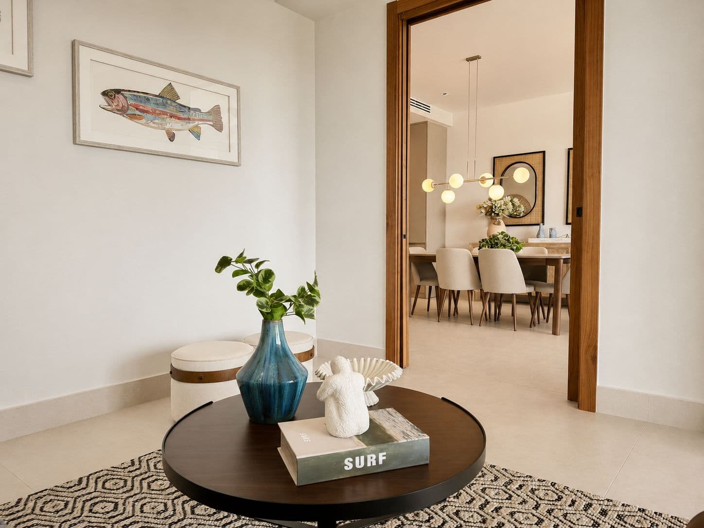 Entrance table with decor in a property managed by Tropical